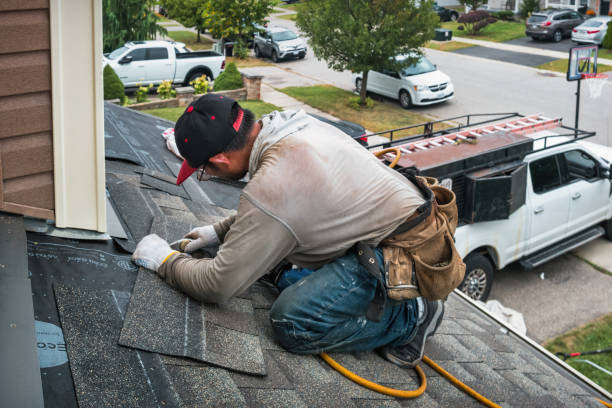 Professional Roofing technician working in Spring Mount, PA